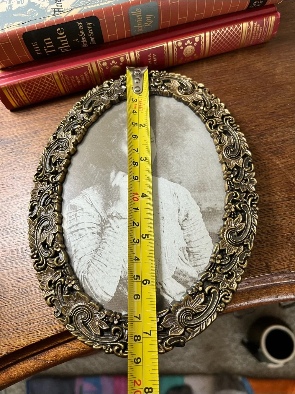 Vintage brass frame with black and white portrait
